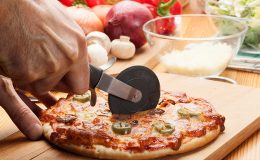 Pizza with cheese, ham and jalapeno pepper